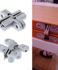 Hidden Cross Hinge for Concealed Mortise Doors, 180 Degree Folding Opening, Alloy Construction, shown detached and installed.