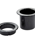 Solid Black Two Point Five Inch Dual Sided Grommets Tailored For Cabinetry And Custom Workspaces Snap Together Quick For A Slick No Sweat Professional Finish, heavy duty black grommets for clean wire routing.