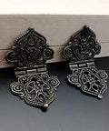 Vintage Alloy Hollow Flower Hinges For Furniture And Cabinets 28x53mm 10 Pack displayed on wood surface