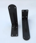 Rock Solid Heavy Duty Metal Corner Brackets For Floating Shelves, matte black iron wall mounts with pre-drilled holes.