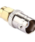 Close-up of copper SMA male to BNC female RF coaxial adapter for antennas and wireless LAN devices, 50 ohm impedance