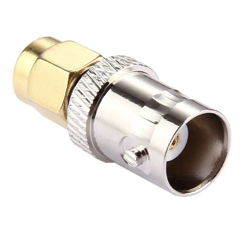 Close-up of copper SMA male to BNC female RF coaxial adapter for antennas and wireless LAN devices, 50 ohm impedance