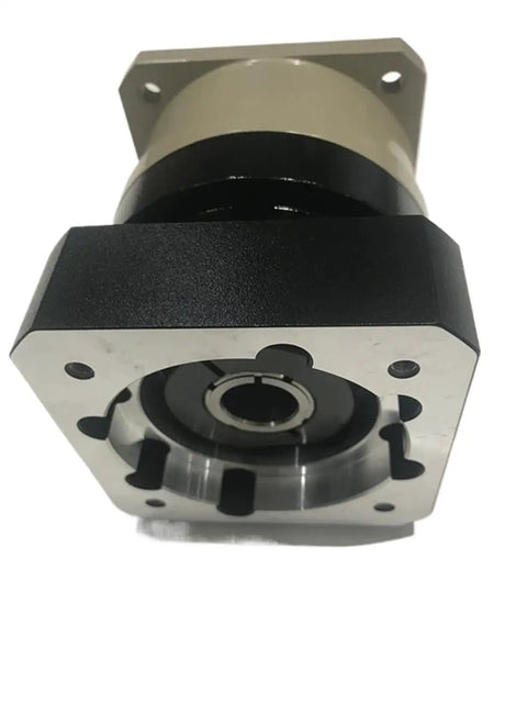 Heavy Duty Helical Gear Reducer Planetary Gearbox Built Tough As Nails For Industrial Jobs With Smooth Power Transmission 3 To 10 Speed Ratios For 80Mm 750W Ac Servo Motor 19Mm Input Shaft close-up view of metallic gearbox
