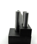 Side view of Heavy Duty Manual Rod Bender For 3/8 Inch Rods Or 1/4 Flat Steel, featuring metal rods in bench vise mount.