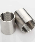 304 Stainless Steel Cast Pipe Coupling Fitting With One Half Inch NPT Female Threads And Polished Finish Workhorse For Plumbing And Industrial Use One Inch Length High Temperature Tolerance And Low Magnetic Permeability, two couplings shown
