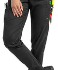 Slip Into These Black Chef Jogger Pants Five Pocket Stretch Kitchen Uniform Drawstring Elastic Waist Cotton Blend Restaurant Cook Workwear Built For The Kitchen Hustle, shown on a female model with pockets.
