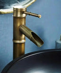 Bathroom Sinks Courtyard Ceramic Art Countertop Basin with stylish bronze faucet and black vessel basin for modern bathrooms