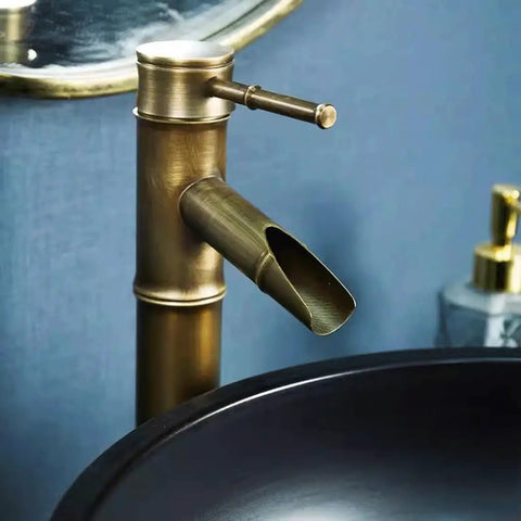 Bathroom Sinks Courtyard Ceramic Art Countertop Basin with stylish bronze faucet and black vessel basin for modern bathrooms