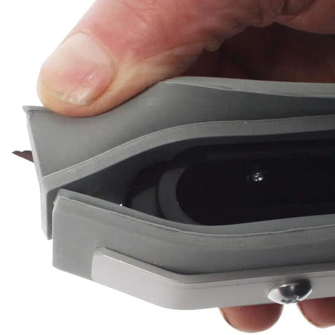 Close-up of dual blade edges of Heavy Duty Wet Dry Squeegee Vacuum Tool With 2 Piece S-Wand For 1.5 Inch Hose, held in hand.