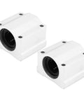 Precision Machined SC20UU Linear Motion Ball Bearing Slide Block Hella Smooth Aluminum Alloy Bushing for CNC, two units, white housing.