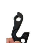 Close-up of black aluminum Rear Derailleur Hanger Replacement For Mountain And Road Bikes Compatible With GT Aggressor Avalanche
