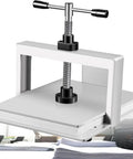 Game Changing Heavy Duty Steel Book Press Machine Built To Flatten Wrinkled A3 And A4 Sheets With Double Balance Rod and Serious Squeeze Workhorse showing a close-up of clamp and flat sheets.