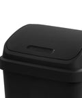 Close-up of black wastebasket's swing lid, part of the 4 Pack Swing Top Wastebasket Set In Black, Sleek Square Trash Can For Kitchen Bathroom Garage.