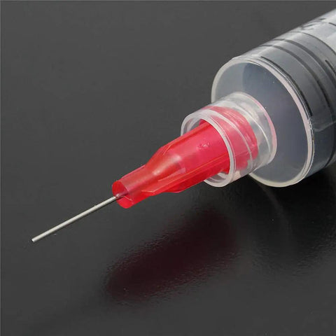 Close-up of red needle cap on 3 Pack 10Cc Syringe Flux Dispenser For SMT SMD PCB Solder Paste Adhesive Glue Liquid Welding Fluxes