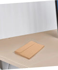 Stack of 60 Pack Kraft Paper Self-Seal Envelopes, Letter Size 10.8 X 15.9 Cm, Writable For Wedding Invitations, Dope Rustic Look on a desk