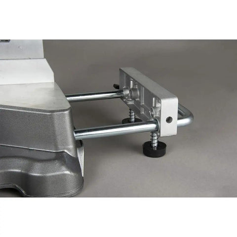 Close-up of 10 Inch Sliding Compound Miter Saw with Adjustable Laser Guide, featuring the metallic pivoting flip fence.