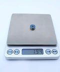 MR125RS 5x12x4 Mm ABEC-3 Blue Sealed 2RS Ball Bearing on digital scale showing weight