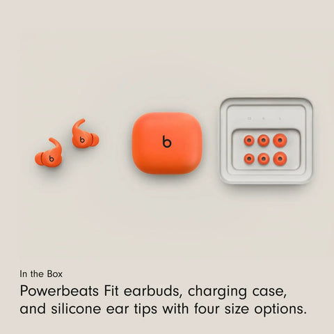 Powerbeats Fit Wireless Earbuds With Secure Wing Tips For Gym Workouts, charging case, and silicone ear tips in four sizes.