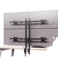 Next Level Quad Monitor Mount For Four Screens, heavy duty steel frame holding two stacked monitors on a desk.