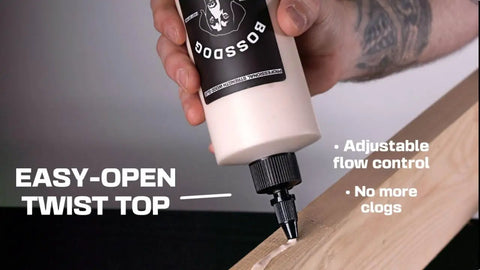 Heavy Duty Brown Wood Glue For Carpentry And Furniture Repair being applied from a bottle with an easy-open twist top.