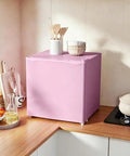 Pink Countertop Mini Freezer 1.1 Cubic Feet Compact Upright Quick Chill No Fuss Energy Saver Straight Up Quiet Operation in kitchen.