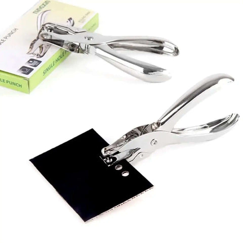 Durable 6mm Metal Hole Punch For Scrapbooking And Loose-Leaf Paper with box, demonstrating clean hole punch on paper