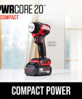 Power Core 20 Brushless 20V Three Eighths Inch Compact Impact Wrench Kit with three speed settings on a table.