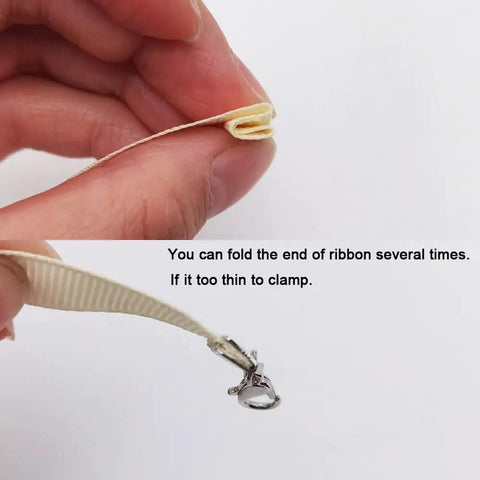 Close-up of folded ribbon end with text showing how to clamp using 100 Sets Bronze Ribbon Crimps Kit With Lobster Clasps And Chain Extenders