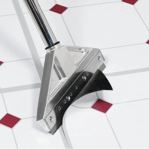 Adjustable Eight Inch Floor Stripper With Telescoping Handle from three to six feet on tile floor, 15-degree angled blade visible