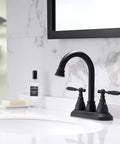 Matte Black 4 Inch Center Set Bathroom Faucet With 2 Handles, 360 Degree Swivel Spout, Vintage Vanity Style, on white sink