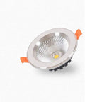 DJVHSRI Recessed Lighting Housing Trim Kits Recessed Spot Lamp showing silver downlight with orange clips, suitable for ceilings.