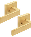 Close-up of two 6 Pack Satin Brass Interior Door Handles With Passage Function, Heavy Duty Hall And Closet Door Lever Knobs, left or right handed.