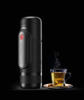 Mini Portable Espresso Machine For Outdoors And Home, Automatic Capsule Coffee Maker With 12 Bar Pressure, cup next to it
