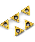 Five TCMT16T304 TCMT32.51 tin coated carbide turning inserts for steel and cast iron, showcasing triangle shape and cutting edges.