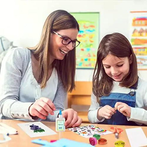Child and adult crafting with Beginner Quilling Kit For Kids And Adults With Tools, Easy Step By Step Instructions visible on table.