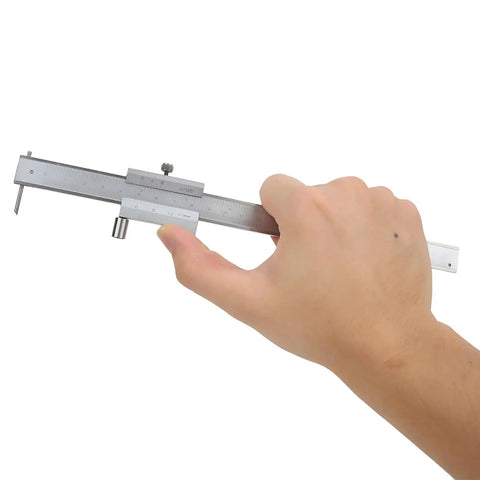 Hand holding a Sturdy Pro Grade Stainless Steel Vernier Caliper With Marking Gauge for engineers, woodworkers, and metalworkers.