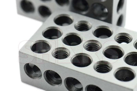 1-2-3 precision block set in silver aluminum with threaded holes and screw set; close-up view