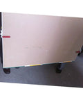 Gypsum Board Lifter And Tile Carrier Tool With Wide Base For Hauling Glass And Plasterboard shown lifting drywall with easy grip handle.