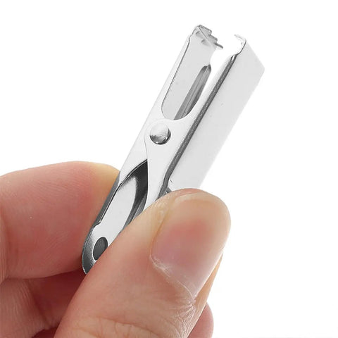 Top Grade 24pcs Metal Alligator Clips Mini Spring Clamp Kit With Strong Clamping Force And Portable Silver Wire Clamps For Lab Testing Work And Electrical Projects That Are Total Game Changers. silver metal alligator clip held between fingers
