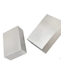 Two hardened steel 1x2x3 precision machinist milling blocks.