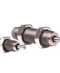 Rugged Stainless Steel Hydraulic Buffer Shock Absorber Straight Up Industrial Heavy Duty Cylinder Damper Kills Vibration For Smooth Machinery Operation Csac-1210N Pack One close-up of two cylindrical dampers with threaded bodies.