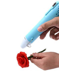 Compact Mini Heat Gun Goes Hard On Sweet Diy Craft Jobs with ergonomic grip used for resin art on red rose