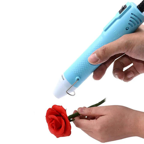 Compact Mini Heat Gun Goes Hard On Sweet Diy Craft Jobs with ergonomic grip used for resin art on red rose