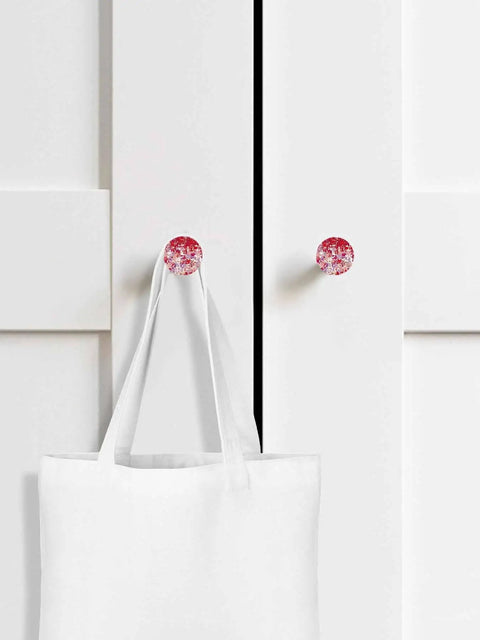 Killer Red Abstract Painted Wooden Cabinet Knobs 2 Piece Set 1.4 Inch Round Drawer Pulls For Kitchen Cabinets on white cabinetry with tote bag.