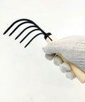 Japanese Ninja Claw Rake And Cultivator 5 Prong Garden Tool With Wood Handle, held in gloved hand, showcasing design and prongs