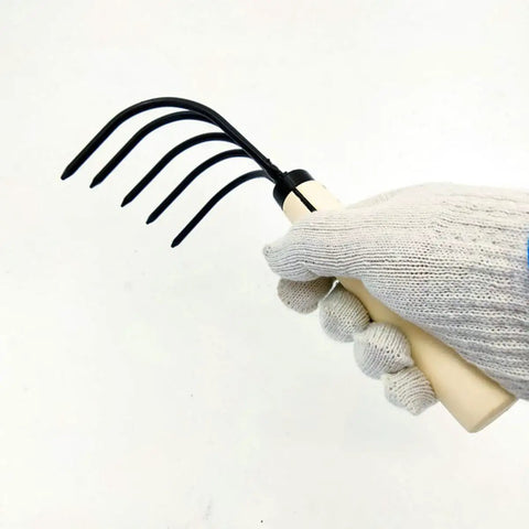 Japanese Ninja Claw Rake And Cultivator 5 Prong Garden Tool With Wood Handle, held in gloved hand, showcasing design and prongs