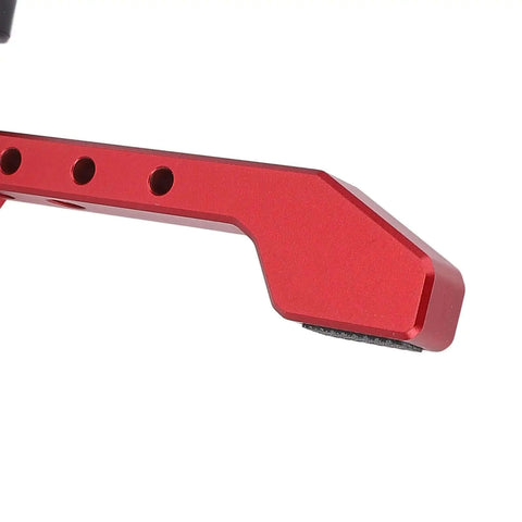 Close-up of red aluminum Bench Dog Clamp 19mm Fit Dog Hole Clamp with Large Pressing Plate for workbench hold down.