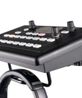 Black 40 Channel Digital Personal Mixer with Customizable Source Routing, knobs, and buttons, shown with headphones.
