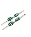 Heavy Duty High Precision Linear Guide Rail Kit Featuring Two Inch Eight HGR15 Slotted Rails With Fourpcs HGH15CA Slider Blocks For Smooth CNC Axis Motion And Zero Friction Movement In Any DIY Project Setup, shown with four carriage blocks on two rails