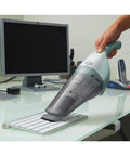 Cordless Handheld Vacuum For Cars And Home Fast Clean, 2Ah Battery, Icy Blue cleaning keyboard on desk
